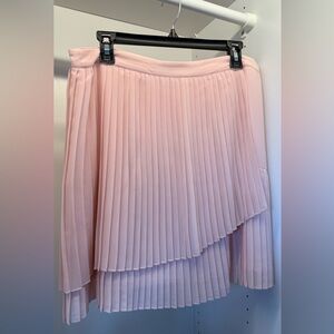 Chic Asymmetrical pink Skirt with Flowing Design and Versatile Style